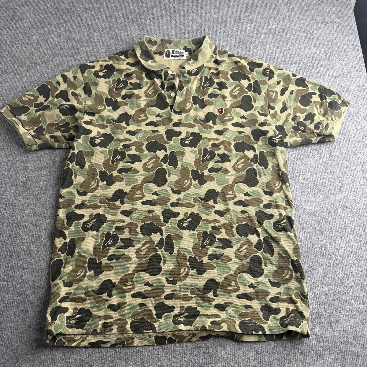 A bathing ape polo (Str. XL)