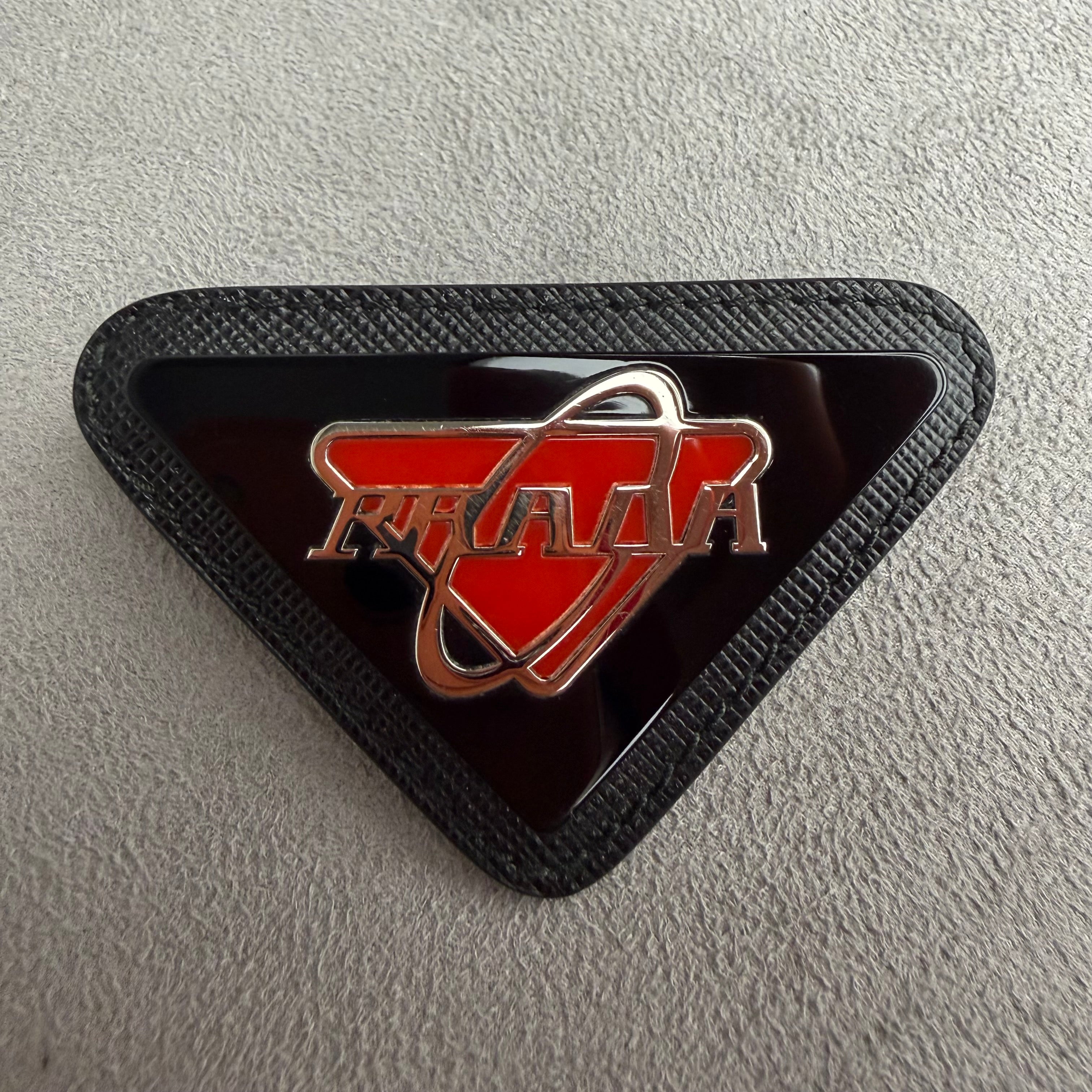 Prada broche