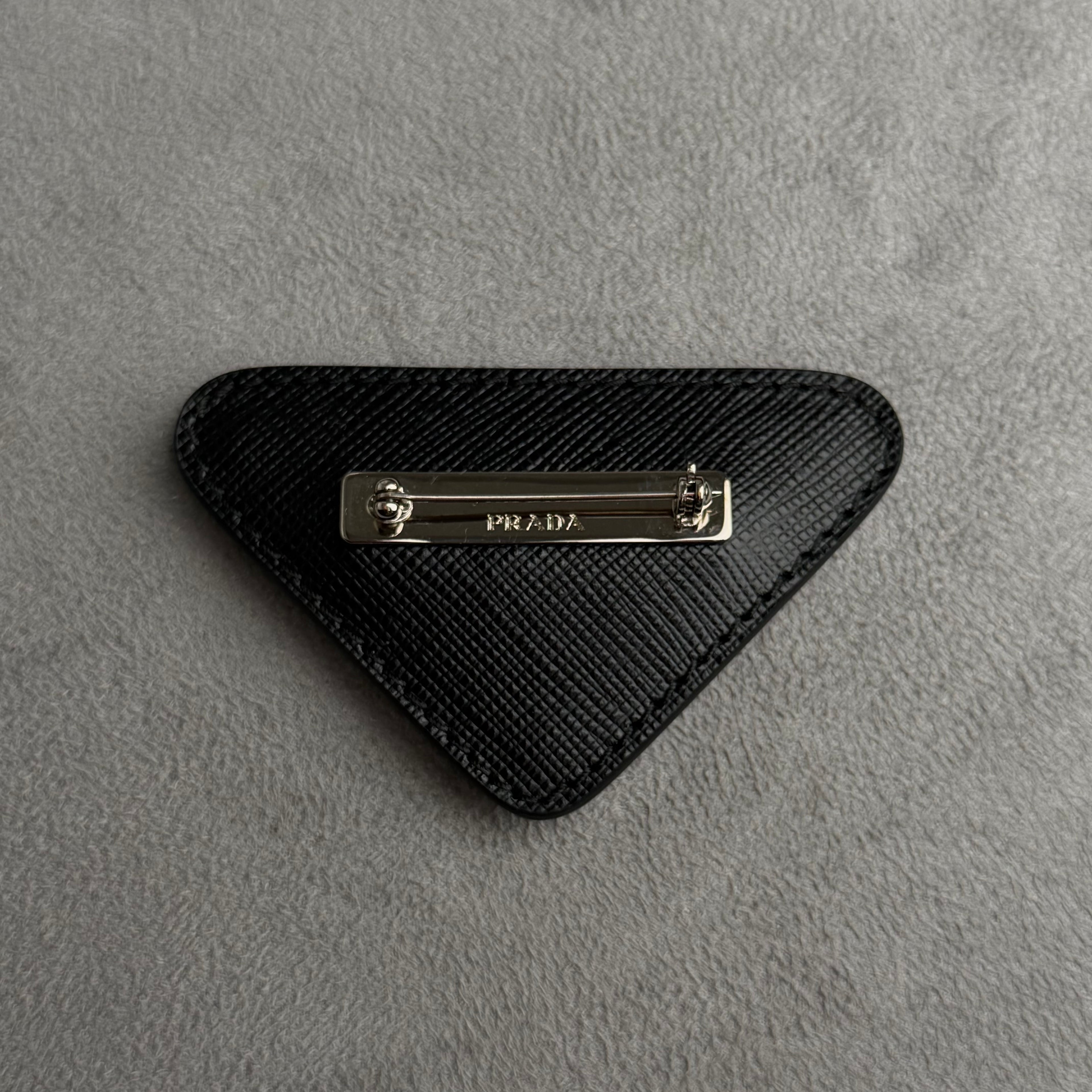 Prada broche