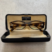 Chanel briller