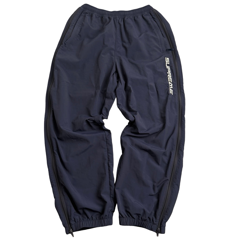 Supreme track pants (Str. S)