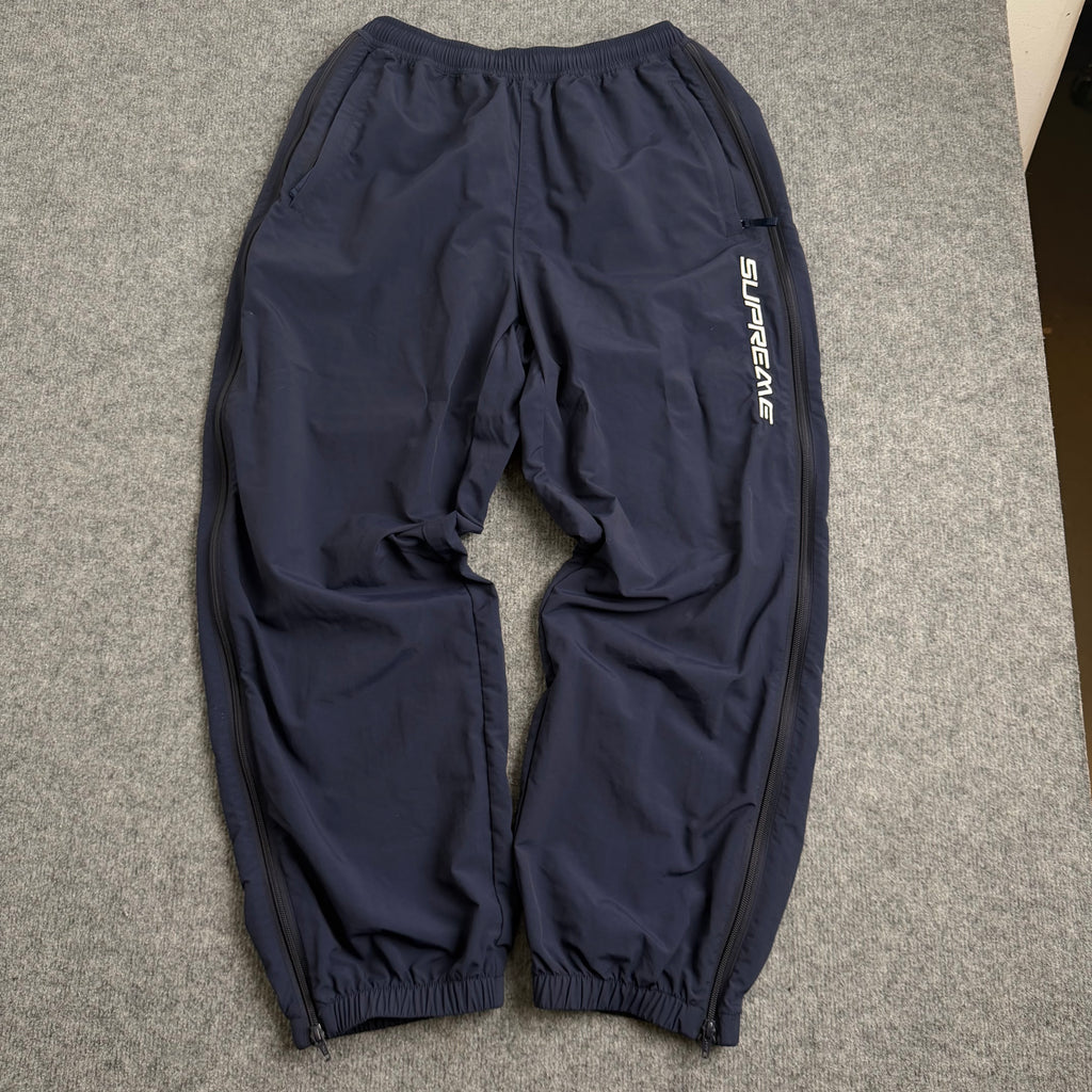Supreme track pants (Str. S)