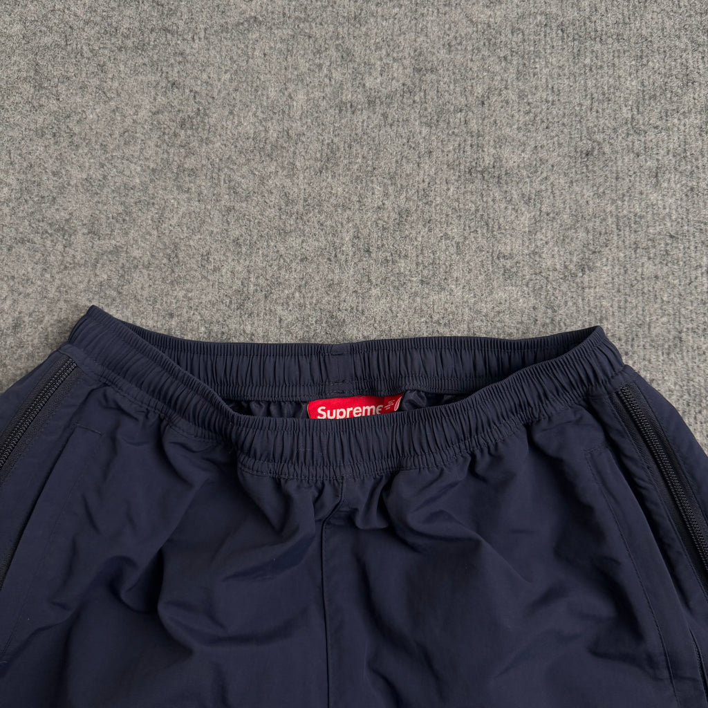 Supreme track pants (Str. S)